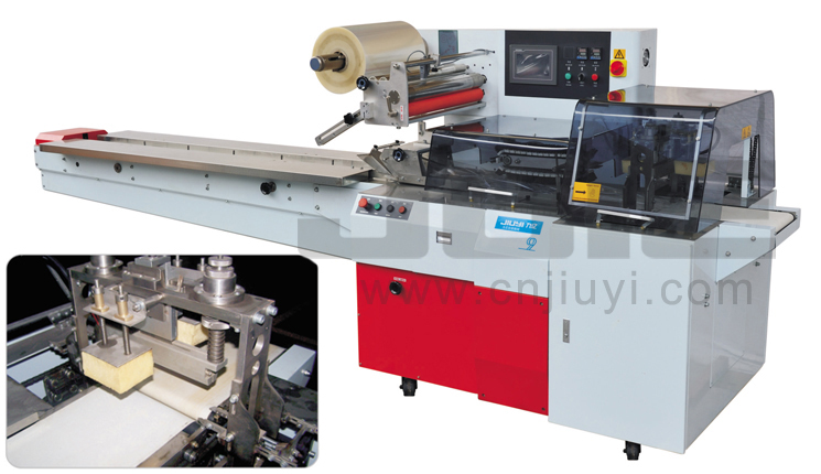 Automatic reciprocating flow wrapping machine 